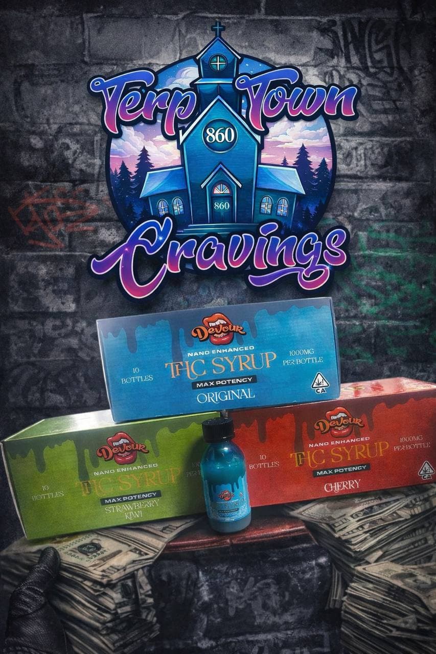 Devour THC syrup boxes and a small bottle arranged with stacks of cash.