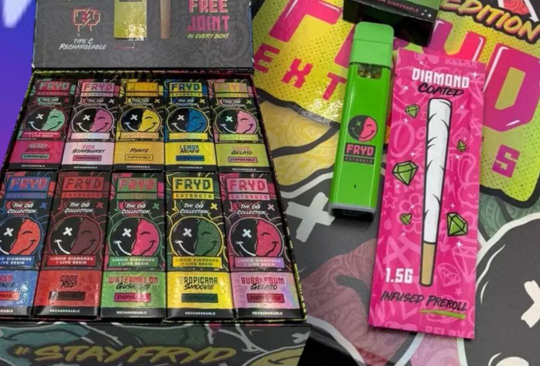 Assorted FRYD Extracts vape cartridges, a green disposable pen, and a pink infused preroll package.