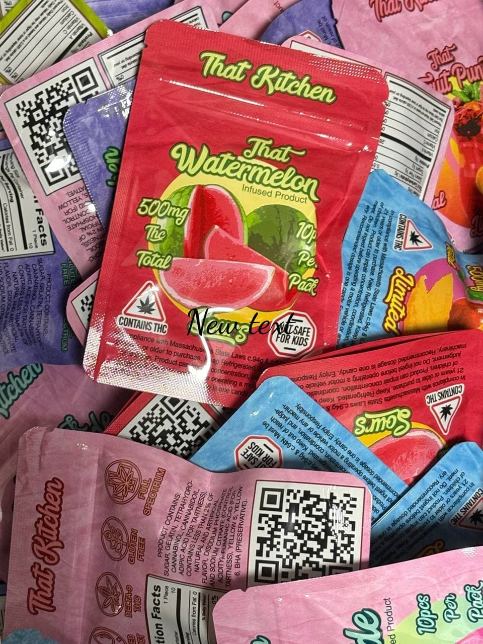 Colorful pile of That Kitchen THC-infused edible pouches, featuring a red watermelon flavored package.